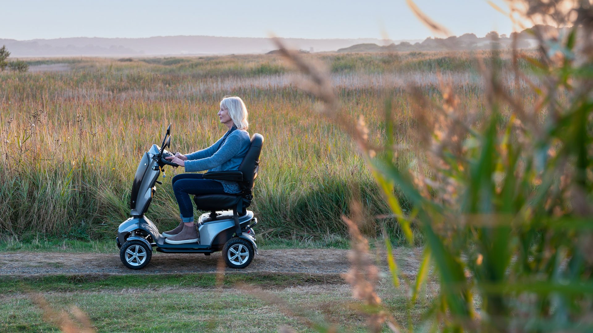 A woman on a Vita mobility scooter