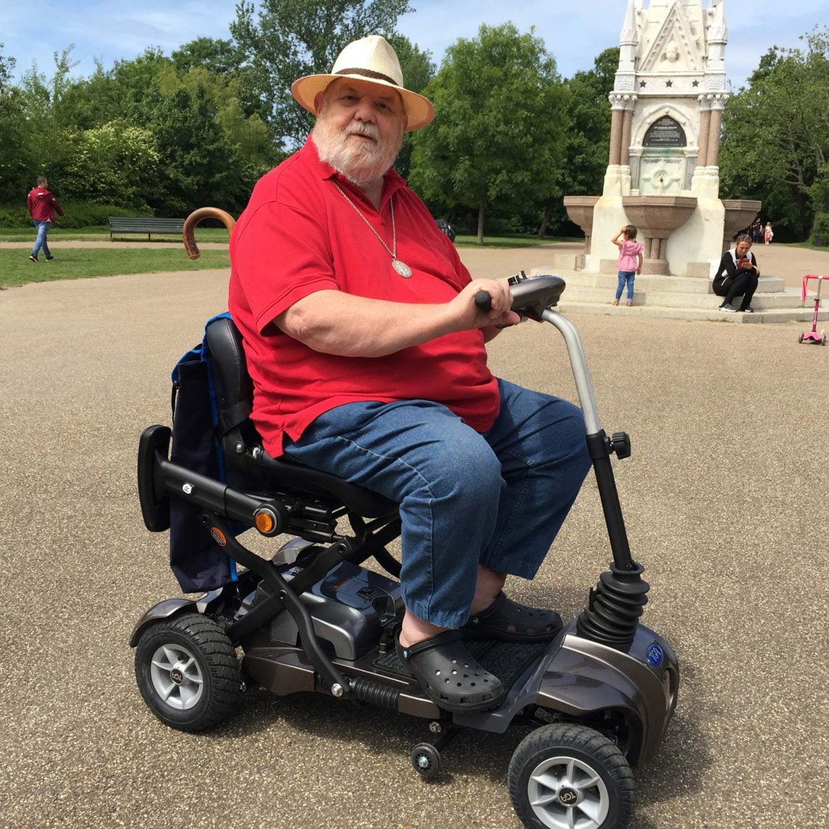 Father Pip Bevan on his Maximo mobility scooter