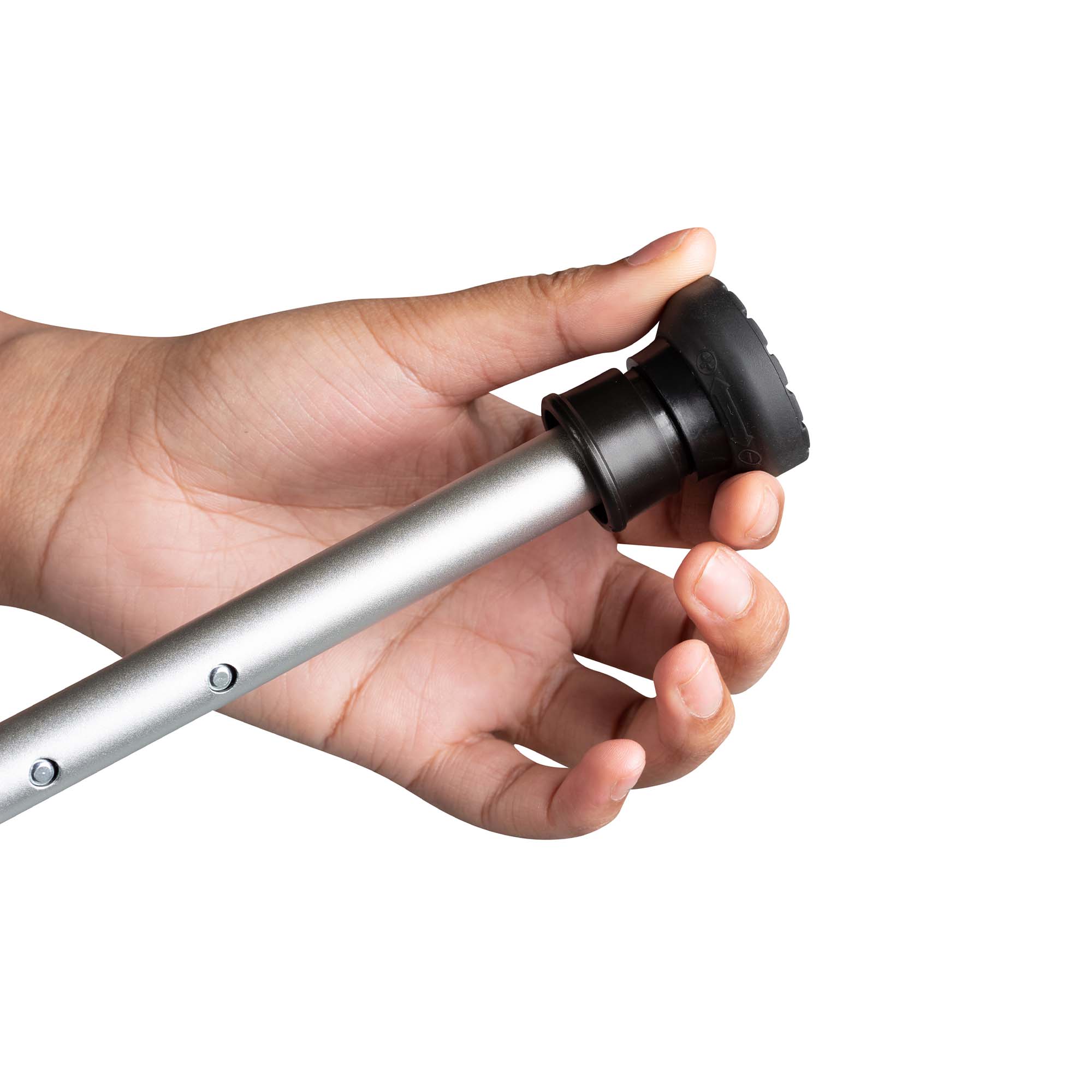 A hand holding the end of a walking stick